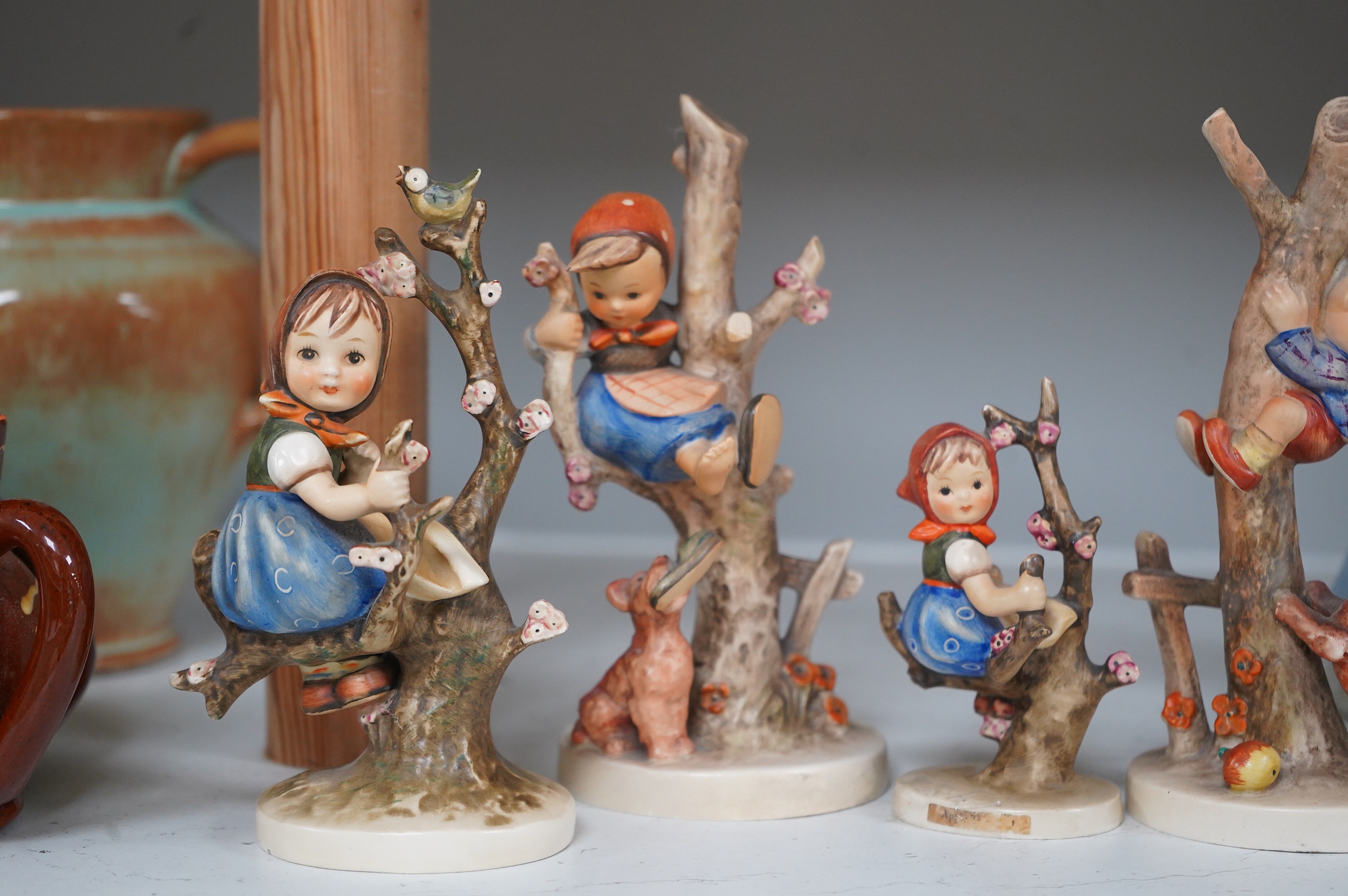 Six various Goebel figures and a Lladro figure, 24cm high